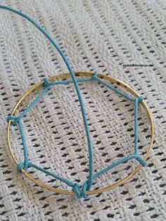 a close up of a bracelet on a table