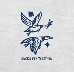 two birds flying next to each other with the words ducks fly together in blue ink