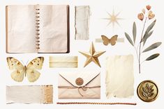 an assortment of papers and other items are arranged in the shape of a flower, butterfly, star, envelope, wax stamp, paper, ribbon, button, pen, scissors, and more