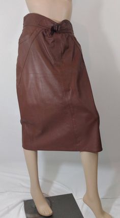 "Brown Skirt 80's 90's Women's Leather Skirt Fully Lined Gorgeous Excellent Condition Vintage  Size 44/M COOL GORGEOUS CHIC! 80's 90's Cool skirt in rich brown genuine leather with fitted waist and buckle front detail that really makes it cool. Fully lined in deep brown, back zipper, back slit, pockets.  Well constructed, expensive, European designer. Super high quality.  Excellent condition. Easy to wear casual chic vintage for the disco sporting life. MEASUREMENTS: Length - 30\" Waist - 30\" H Womens Leather Skirt, Brown Suede Skirt, 80s Skirt, Carrie White, Brown Leather Skirt, Beaded Fashion, Brown Skirt, Brown Skirts, Deep Brown