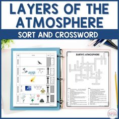 the layers of the atmosphere sort and crossword on a blue book with pencils