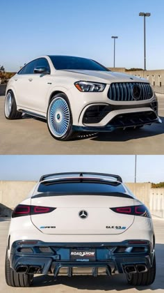 the front and side view of a white mercedes suv in a parking lot with blue wheels