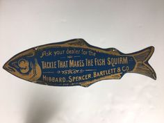 there is a sign that says take that makes the fish squirm on it