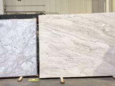 two white marble slabs sitting next to each other