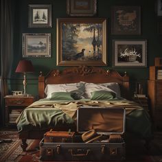 a suitcase is sitting on the floor next to a bed in a room with green walls