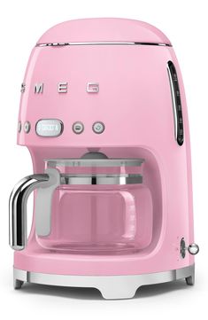 a pink coffee maker on a white background