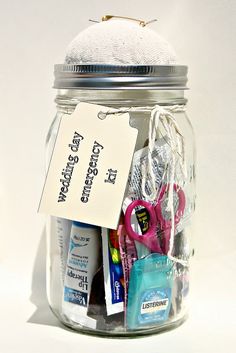 a jar filled with lots of items and a tag that says, i love you