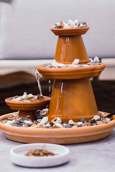 a water fountain sitting on top of a table