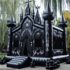 an inflatable castle with black and white decorations