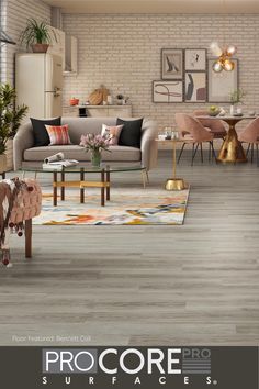 a living room filled with furniture next to a white brick wall and floored floors