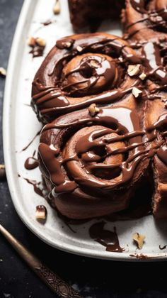 a plate with some chocolate desserts on it