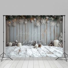 a christmas backdrop with candles and snowflakes