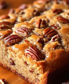 a piece of bread with pecans on top