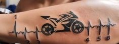 a man with a tattoo on his arm has a motorbike drawn on it