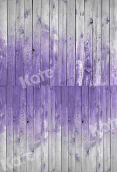 an old wooden fence painted in purple and white with the word love written on it