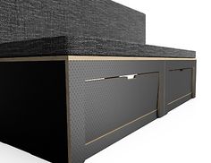 an image of a black and gold bed with drawers on the bottom part of it