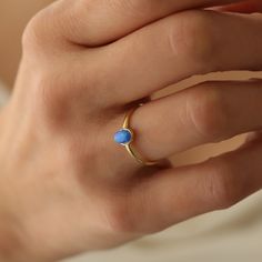 14k Opal Ring,Dainty Ring, Blue Opal Ring,Minimalist Ring, Real Opal ring ❤️Minimalist look and dainty design❤️ ABOUT PRODUCTS; Handmade with 14k Gold,925 Solid Sterling Silver We have color options. Silver Gold Rose gold Comes with a stylish gift-ready elegant jewelry box ** ANY PROBLEMS AND PLEASE CONTACT ME IN ORDER CONTENT, THANK YOU ** Adjustable Blue 14k Gold Rings, Minimalist Blue Stackable Rings In 14k Gold, Minimalist Blue 14k Gold Stackable Rings, Dainty Blue 14k Gold Rings, Minimalist Blue Round Band Ring, Minimalist 14k Gold Opal Ring, Minimalist 14k Gold Opal Promise Ring, Blue Gemstone Midi Promise Rings, Dainty 14k Gold Solitaire Opal Ring