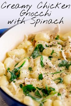 creamy chicken gnocchi with spinach and delicious cheese sauce in a blue bowl