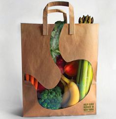 a brown paper bag filled with different types of fruits and vegetables