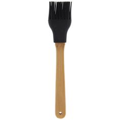 a wooden brush with black bristles on it