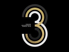 the number three in gold and white on a black background