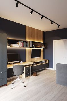 a modern home office with black walls and wooden shelves on either side of the desk