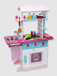 a pink and blue play kitchen with stove, oven, sink and counter top on white background