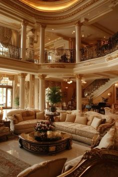 a living room filled with lots of furniture next to a spiral stair case in a large building