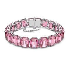 NWB Swarovski Millenia Bracelet, Octagon Cut, Pink, Rhodium Plated- 5610363 Description This pink, crystal bracelet is perfectly crafted with uniform, octagon-cut crystals on a sleek, rhodium-plated prong setting and finished with a fine-jewelry-inspired fastening. An elegant wardrobe essential, this piece can be worn on its own for an ultramodern daytime look, or teamed with the complementary necklace from the Millenia family for chic evening adornment. This bracelet is part of the Millenia family, designed by Creative Director Giovanna Engelbert for Collection III. How to close and open it: slide the hooks into the corresponding holes at the base of the end stone and push to click into place. Fasten the security chain using the small lever clasp. To open, unfasten the security chain and Swarovski Millenia, Pink Crystal Bracelet, Pink Sapphire Jewelry, Swarovski Jewelry, Pink Bracelet, Crystal Bracelet, Pink Crystal, Italian Charm Bracelet, High Quality Jewelry