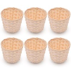 six empty wicker baskets sitting side by side