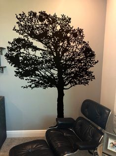 a black tree wall decal in a living room