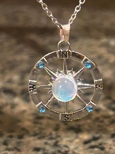 Silver compass  pendant with opal in the middle at 18inches with two inche extender.  Super unique necklace makes a great gift! Comes packaged beautifully ready to gift! Cotton Dress Indian, Compass Pendant, Dress Indian, Unique Necklace, Opal Necklace, Unique Necklaces, Cotton Dress, Compass, Pendant Necklaces