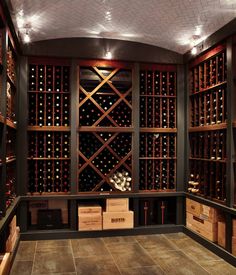 a wine cellar filled with lots of bottles