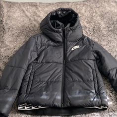 Bnwot Nike Black Down Puffer With Insulation Technology. Front Zip Closure, Side Pockets And A Hood That Is Not Detachable. Elastic Details At The Bottom With The Signature Logo. Super Unique And Cute Price Is Firm. Black Down, Nike Black, Signature Logo, Black Nikes, Nike Jacket, Insulation, Nike Women, Puffer, Jackets & Coats