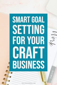 a notepad with the words smart goal setting for your craft business on top of it