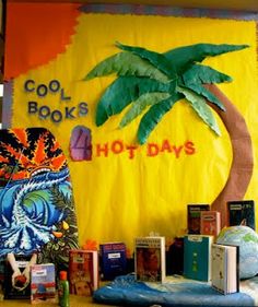 there are many books on the table and in front of this sign that says cool books, hot days