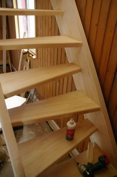 a set of stairs made out of wood