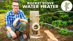 a man kneeling down next to a water heater in the woods with text reading rocket stove water heater