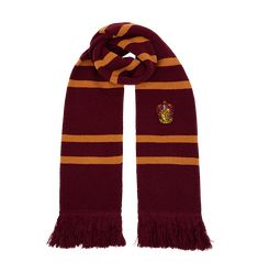 a harry potter scarf with a hogwarts crest on the front and gold stripes