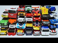 a pile of toy cars sitting next to each other