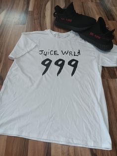 This Juice WRLD Tee is a handmade masterpiece, crafted with meticulous attention to detail. Its high quality fabric ensures comfort and durability, suitable for everyday wear. Make a style statement with this unique tee that reflects artistry and individuality. Juice World, Design Fonts, Graphic Design Fonts, Women Outfits, Style Statement, Tee Shirt, Quality Fabric, Gender Neutral, Everyday Wear