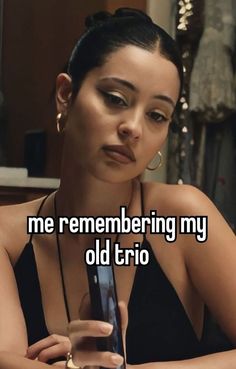 a woman looking at her cell phone with the caption me remembers my old trio