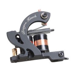 the tattoo machine has two coils attached to it's holder and is black