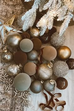 christmas ornaments and decorations on a table