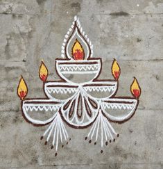 a painting on the side of a wall with candles