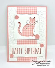 a pink and white card with a cat on it