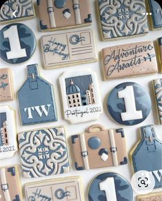 decorated cookies are displayed on a table