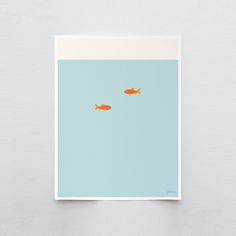 two goldfish swimming in the water on a blue and white card with an orange border