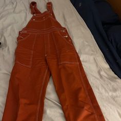 Burnt Clay Colored Overalls From Big Bud Press, Size Xxs. Have Been Shortened (I’m 5’2) And The Legs Have Been Taken In A Little. Big Bud Press Trousers, Orange Workwear Bottoms With Pockets, Big Bud Press Overalls, Colored Overalls, Orange Corduroy Overalls, Big Bud Press, Orange Red, Color Orange, Pant Jumpsuit