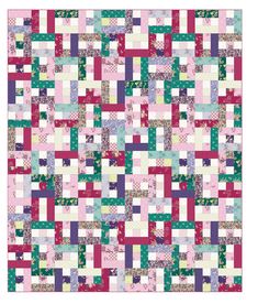 a pink and green patchwork quilt